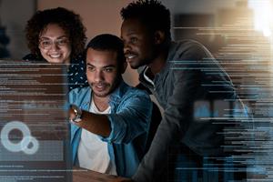 three people looking at data