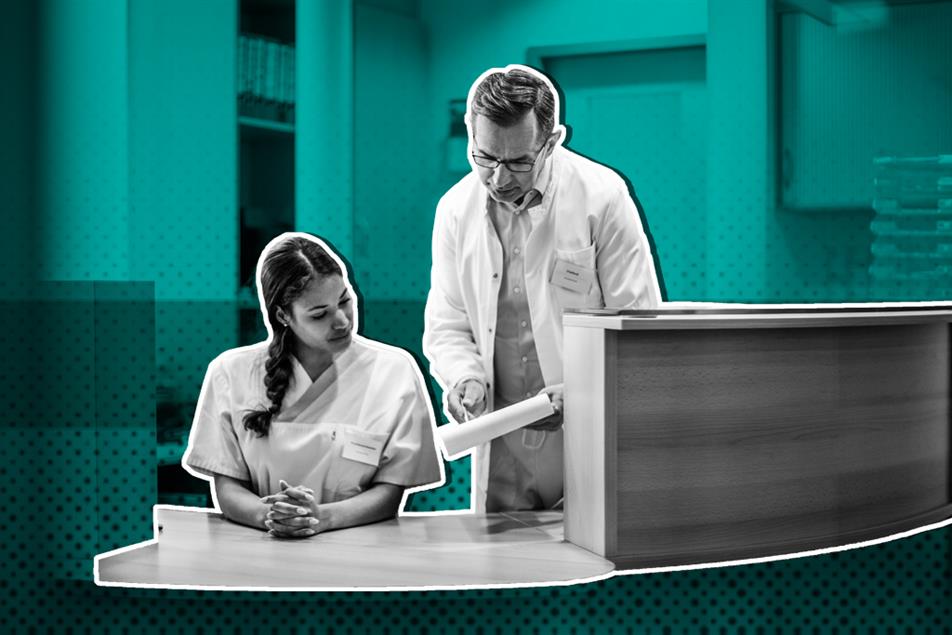 Medical secretary and doctor talking