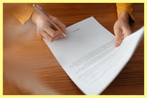 Woman signing contract