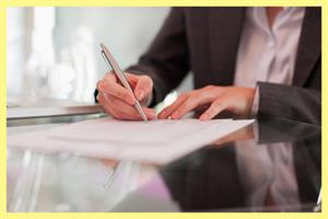 Man signing document