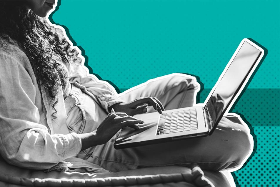 Person sat with a laptop