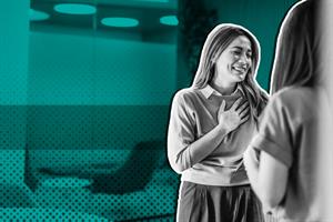 Grateful businesswoman thanking her colleague for good news in the office