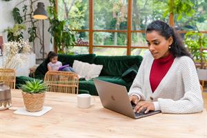 Woman working at home on laptop