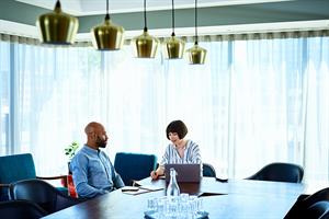 Man and woman at table