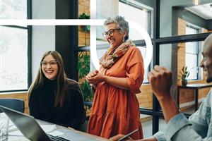 Colleagues in office laughing