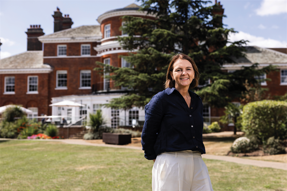 Kelly Howell stood outside Aria Care home