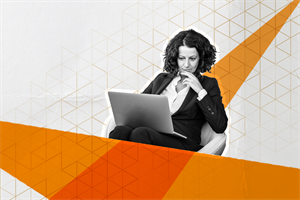 Woman sat looking at a laptop