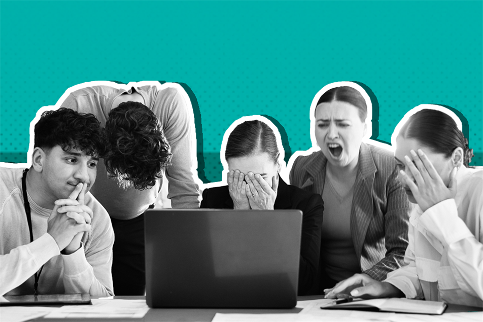 Group of people sat around a laptop looking shocked