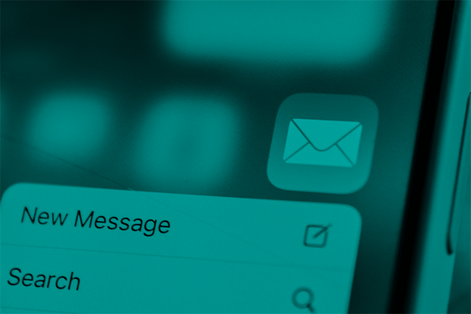 Close up of a phone screen with an email icon on it