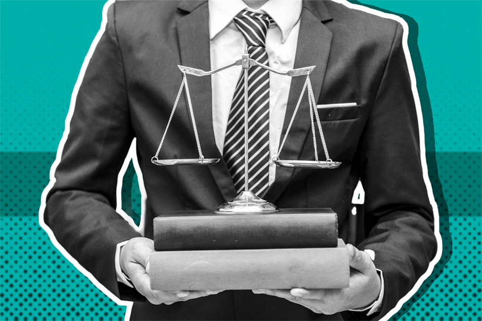 Man holding scales of justice