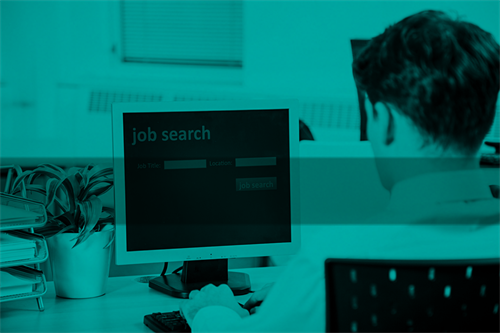 Person sitting in front of a computer screen