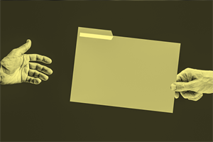 Close up of a hand holding a file