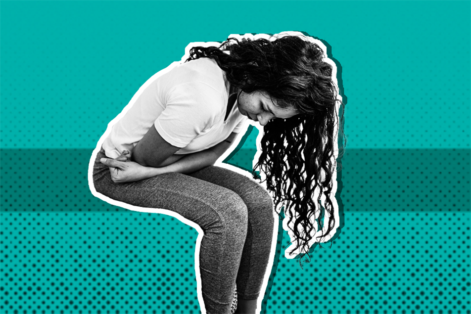 Woman sat down and bending over