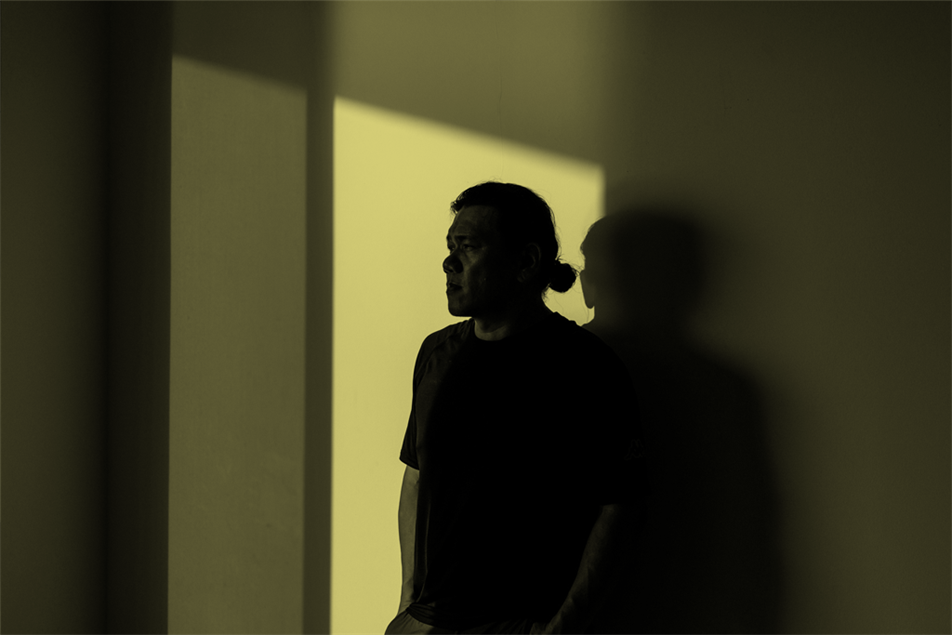 Person standing in the dark