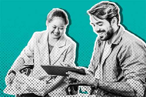 Two people looking at a tablet