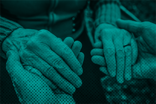 Close up of people holding hands