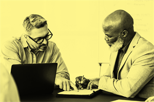 People signing a contract