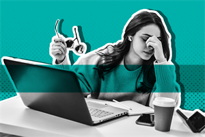 Person sat at a laptop and turned away