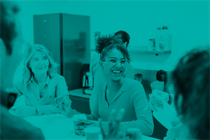 People sat in a kitchen talking