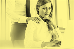 Close up a hand on a woman's shoulder