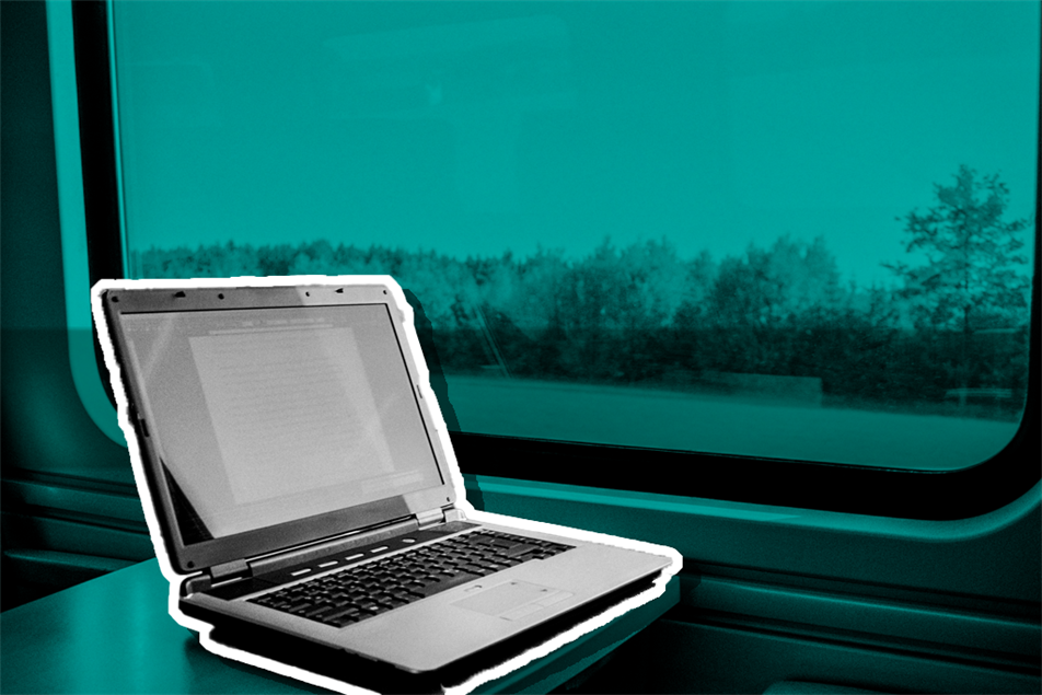 Laptop open on a train