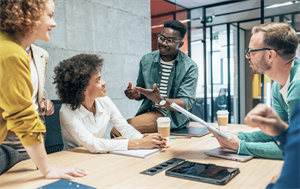 Diverse group of workers engaging in a meeting