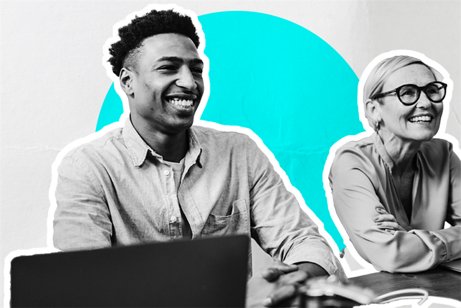 Two people sat smiling